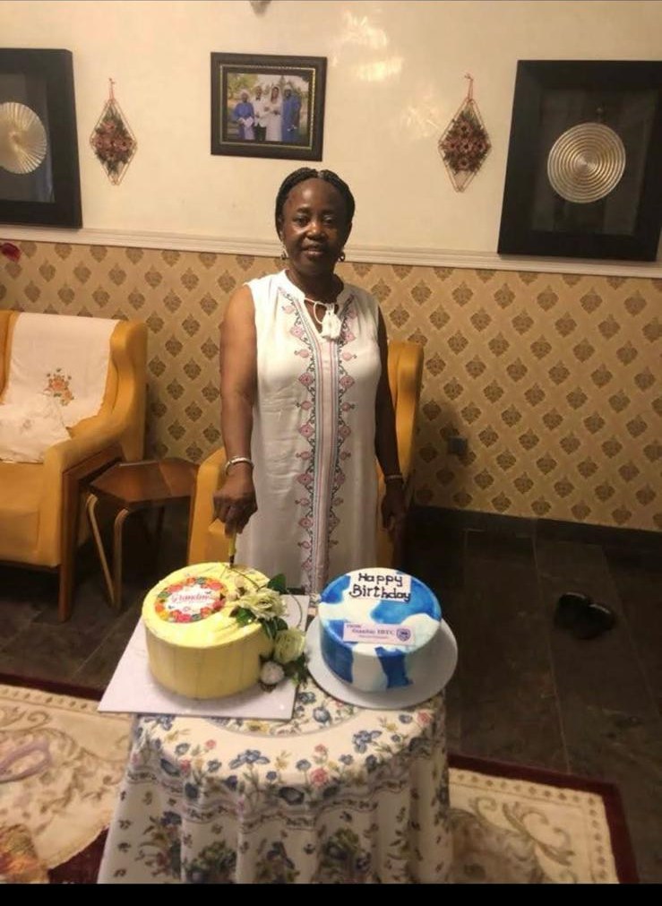 Oludayo Olorundara cutting her birthday cakes