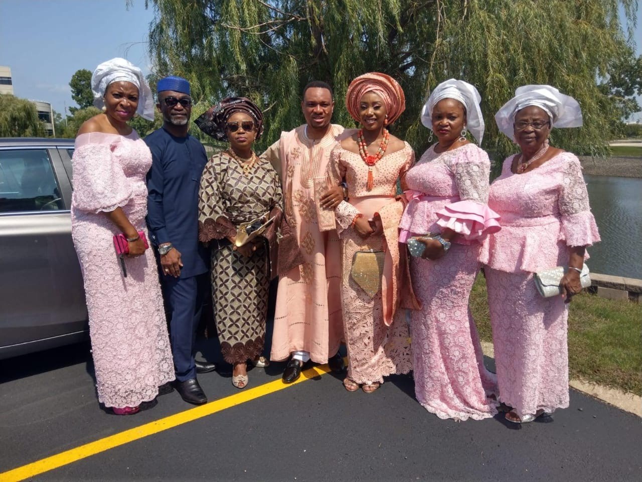 Oludayo Olorundara with the couple at her daughter's wedding